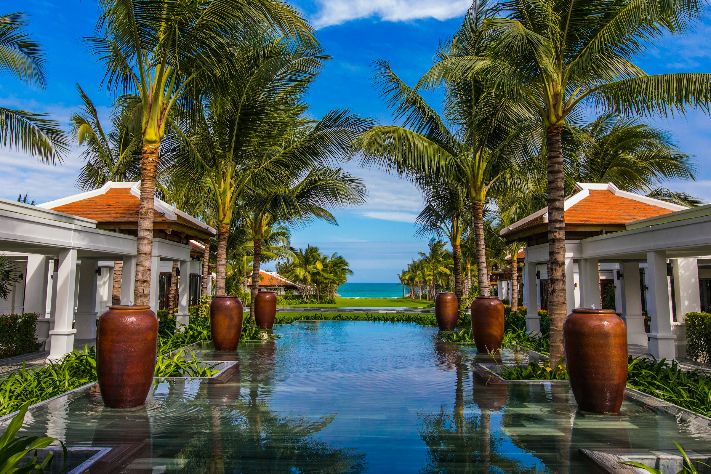The garden and pool at one of the coastal Ayurveda centres on our list