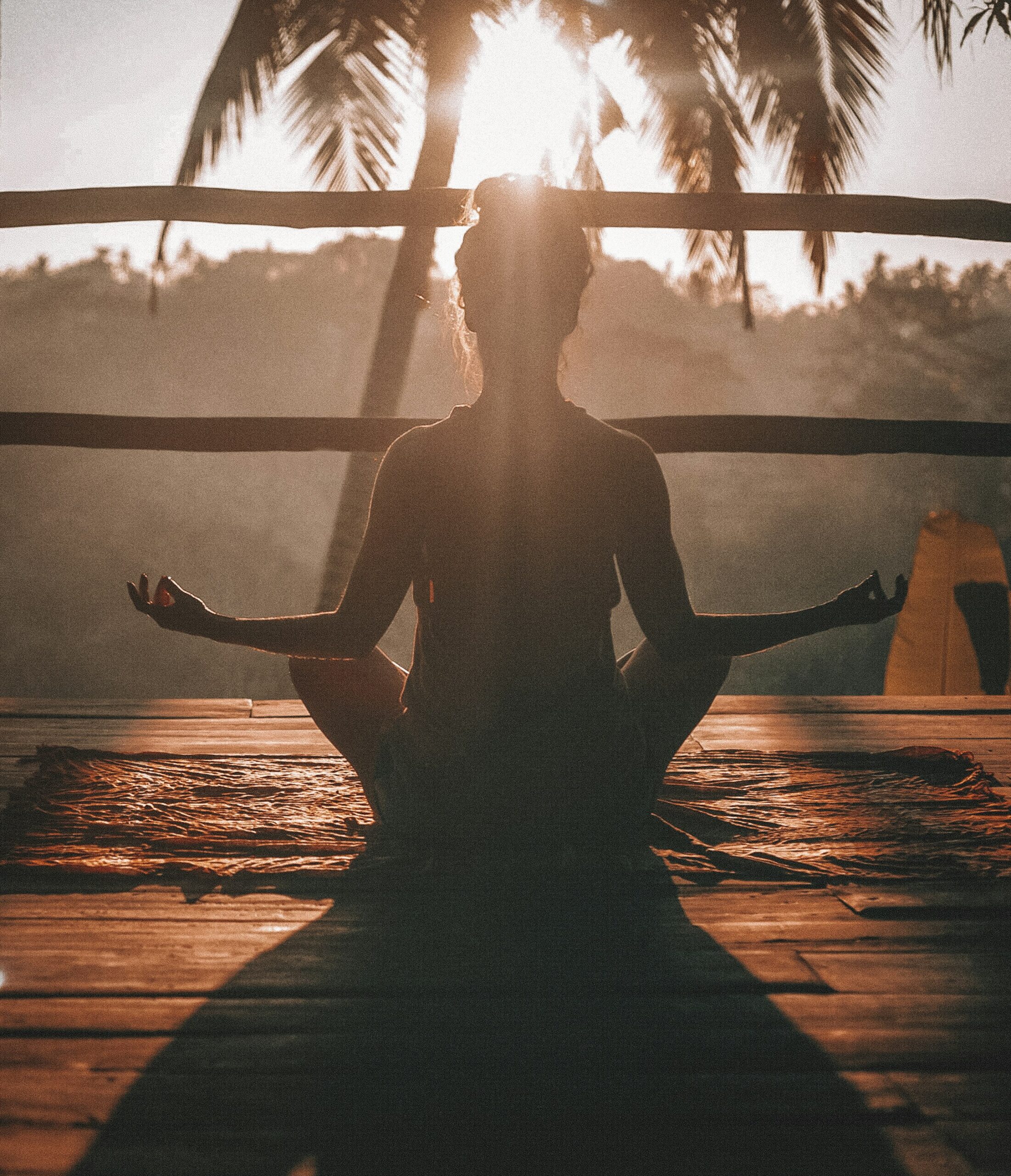 Yoga practice at sunrise on an empty beach on Sri Lanka's south coast